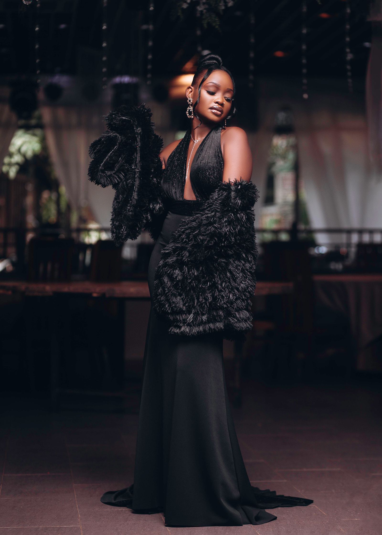 A sophisticated black evening gown for the mother of the bride